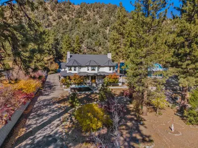 an aerial view of a house in the mountains at Mountain High Luxury Castle &Spa in Wrightwood