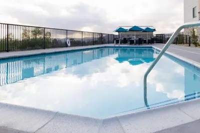 a large swimming pool with blue water at Hampton Inn & Suites Porter Ranch Los Angeles in Deer Lake Highlands