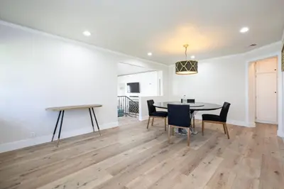 a dining room with a table and chairs at Beautiful Spacious Home in Los Angeles