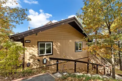 a tiny house in the woods at EV level 2, Pets Welcome at Sunset Ridge in Lake Arrowhead