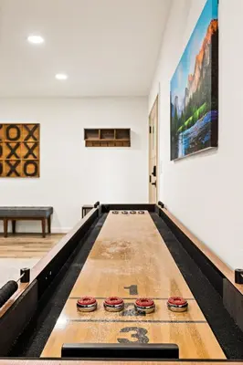 a bowling alley with four pins in a room at EV level 2, Pets Welcome at Sunset Ridge in Lake Arrowhead