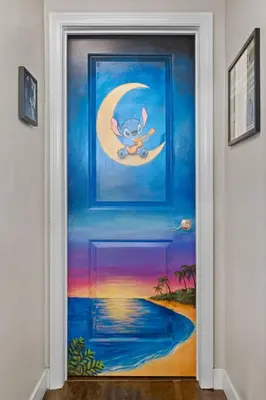 a door with a painting of a mouse on the moon at Galaxy Quest by OC Adventure Homes in Garden Grove