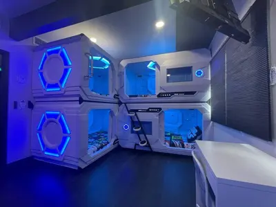 an empty room with blue lights in a bathroom at Galactic Dream by OC Adventure Homes in Garden Grove