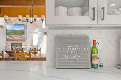 a kitchen with a bottle of wine on the counter at HoneyBear Lodge Lakefront in Big Bear Lake