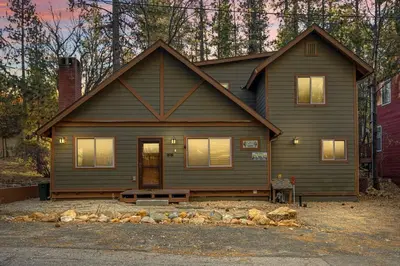 a large house with a porch and a house at The Great Escape in Big Bear Lake