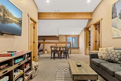 a living room with a couch and a table at The Great Escape in Big Bear Lake