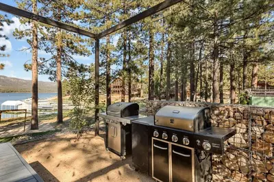 an outdoor grill with two burners on a patio at Lakefront View Stunner in Big Bear Lake