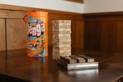 a can of chips and a stack of playing cards at Knoll Lake Cabin in Big Bear Lake in Big Bear Lake