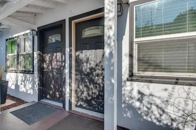 a front door of a house with a window at Van Nuys Abode with Patio, 7 Mi to Universal Studios in Van Nuys