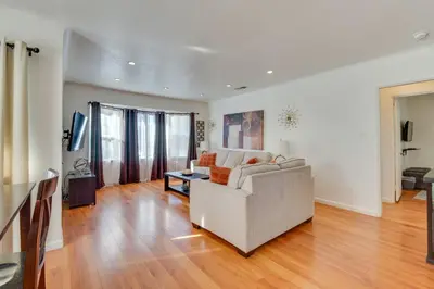 a living room with a couch and a table at North Hollywood Getaway 14 Mi to Downtown! in North Hollywood