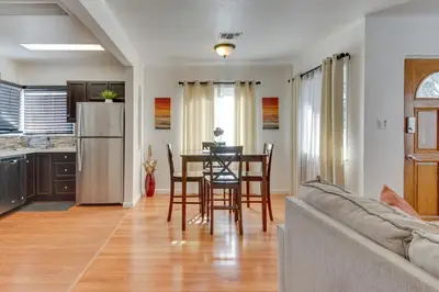 a kitchen and living room with a table and chairs at North Hollywood Getaway 14 Mi to Downtown! in North Hollywood
