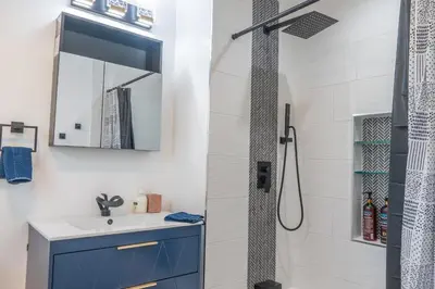 a bathroom with a sink and a shower at Beautiful hillside gateway in Los Angeles