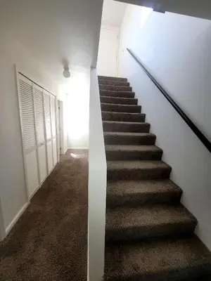 a staircase in a house with a stair case at 4 Bedrooms & 2.5 Bathrooms in LA in Los Angeles