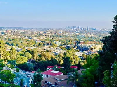 an aerial view of a city with buildings and trees at Hollywood Hills Haven-Guest House in Los Angeles