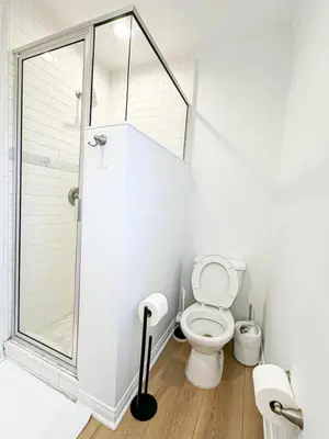 a bathroom with a toilet and a walk in shower at Modern 2-Bedroom Gem Close to Beverly Hills - DOH2 in Los Angeles