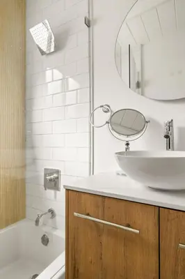 a bathroom with a sink and a mirror at NEW! Ocean View Mid-Century Modern Beach House in Manhattan Beach