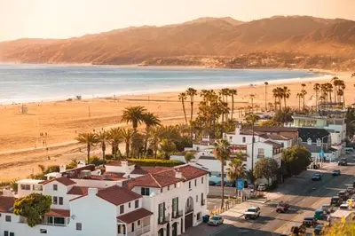 an aerial view of a beach with palm trees and houses at 2 Santa Monica Beach Walking in Los Angeles