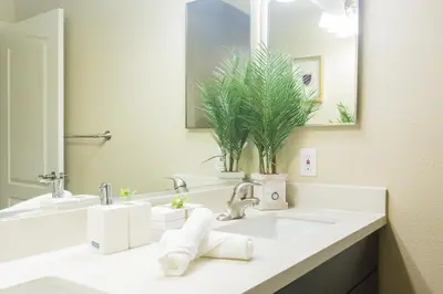 a bathroom with a sink and a mirror at Sunny Living l Walk to the Marina in Los Angeles