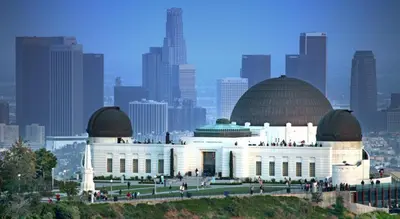 a large white building with domes on top of a city at Crenshaw Inn Motel in Los Angeles