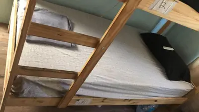 a set of bunk beds in a room at Robertson's Place Like Home in Los Angeles