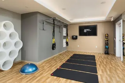 a room with a gym with a blue ball and a yoga mat at Playa Vista 2br w pool gym wd nr 405 LAX-985 in Los Angeles