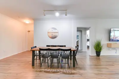 a dining room with a table and chairs at Spacious, Comfortable, and Central Condo in Los Angeles