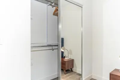 a glass mirror in a dressing room with a desk at Redondo Beach 2br walk to shops restaurants LAX-1166 in Torrance