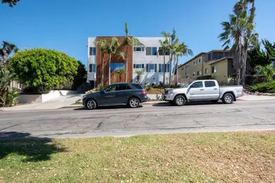 two cars parked on the side of a street at Redondo Beach 2br walk to shops restaurants LAX-1166 in Torrance