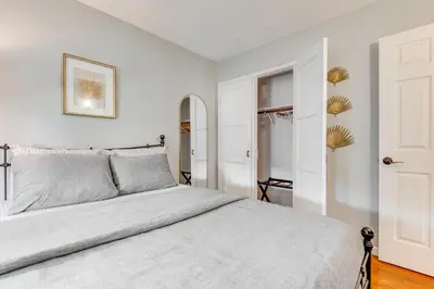 a white bedroom with a bed and a closet at 1 Mi to Shopping and Dining Central Burbank Duplex in Burbank