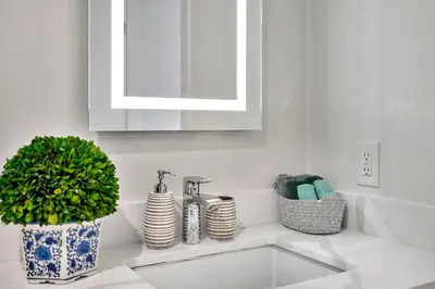 a kitchen counter with a sink and a faucet at 13 Luxury apartment in Los Angeles