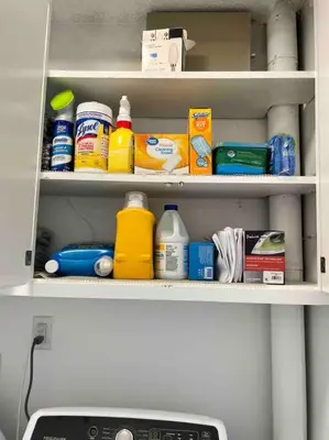 a cabinet filled with lots of cleaning products at Comfortable & Modern 3BD/2BA Home -pet friendly! in Lawndale