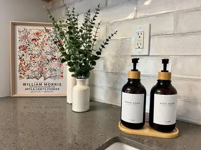 two bottles of wine sitting on top of a counter at Comfortable & Modern 3BD/2BA Home -pet friendly! in Lawndale