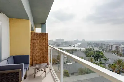 a balcony with a view of a city at Nautical 2 Bedroom with Beautiful Ocean Views in Los Angeles
