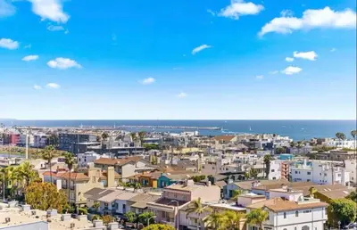 a view of a city with buildings and the ocean at Nautical 2 Bedroom with Beautiful Ocean Views in Los Angeles
