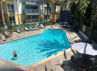 a swimming pool with a person in the water at Nautical 2 Bedroom with Beautiful Ocean Views in Los Angeles