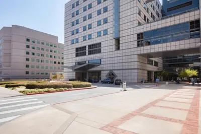 a large building with a street in front of it at Westwood 1BR w Gym Pool Spa nr UCLA LAX-265 in Los Angeles