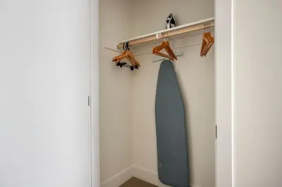 a closet with a blue tie hanging on a wall at Inglewood 1br w sundeck clubhouse nr shopping LAX-1160 in Inglewood
