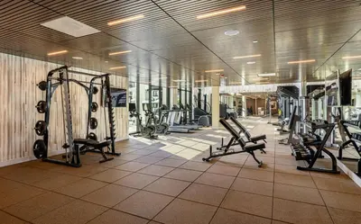 a gym with treadmills and machines in a building at Inglewood 1br w sundeck clubhouse nr shopping LAX-1160 in Inglewood