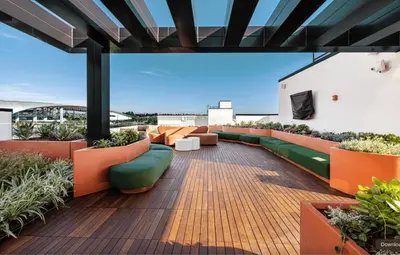 a rooftop patio with orange and green furniture and plants at Inglewood 1br w sundeck clubhouse nr shopping LAX-1160 in Inglewood
