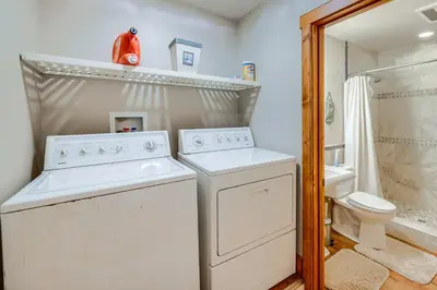 a laundry room with a washer and dryer at Pine Mountain Club Cabin with Private Deck and Views! in Pine Mountain Club