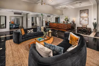 a living room with couches and a pool table at Stylish 2 Bed 2.5 Bath Condo Near Beverly Hills. in Los Angeles