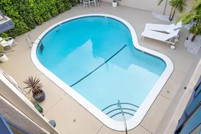 an overhead view of a swimming pool on a patio at Luxury 2br 2ba Beverly Hills Near Cedars Sinai in Los Angeles