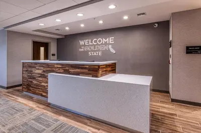 a welcome sign on a wall in a lobby at Hampton Inn & Suites Bakersfield Central in Bakersfield