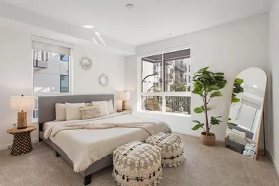 a bedroom with a large bed and a large window at Luxury 1BDR centrally located in Hollywood in Los Angeles