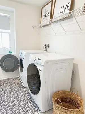 a laundry room with a washing machine and a sink at Claremont Colleges And Ontairo Mills Single Villa stay more 30 nights in Upland