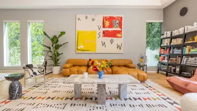 a living room with a table and a couch at Luxe WeHo Villa Walk to Melrose Ave Pool Hot Tub North Vista by AvantStay in Los Angeles