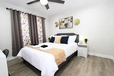 a bedroom with a bed and a ceiling fan at NEW! 2-Bedroom Fontana Guest House close to Kaiser Permanente in Fontana