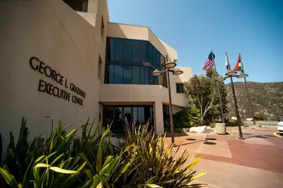 a building with an american flag in front of it at Villa Graziadio Executive Center at Pepperdine University in Malibu