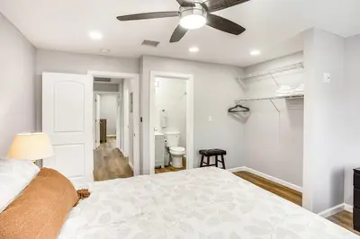 a bedroom with a bed and a ceiling fan at Rental with Pool Access about 8 Mi to Disneyland in La Palma
