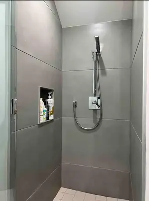 a shower with a shower head in a bathroom at Cozy Luxerius 1 bed Loft Venice in Los Angeles